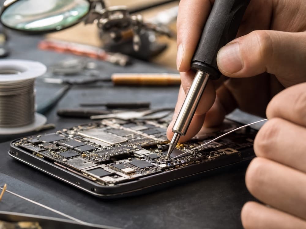 Motherboard Repair in progress at iRepairTrust